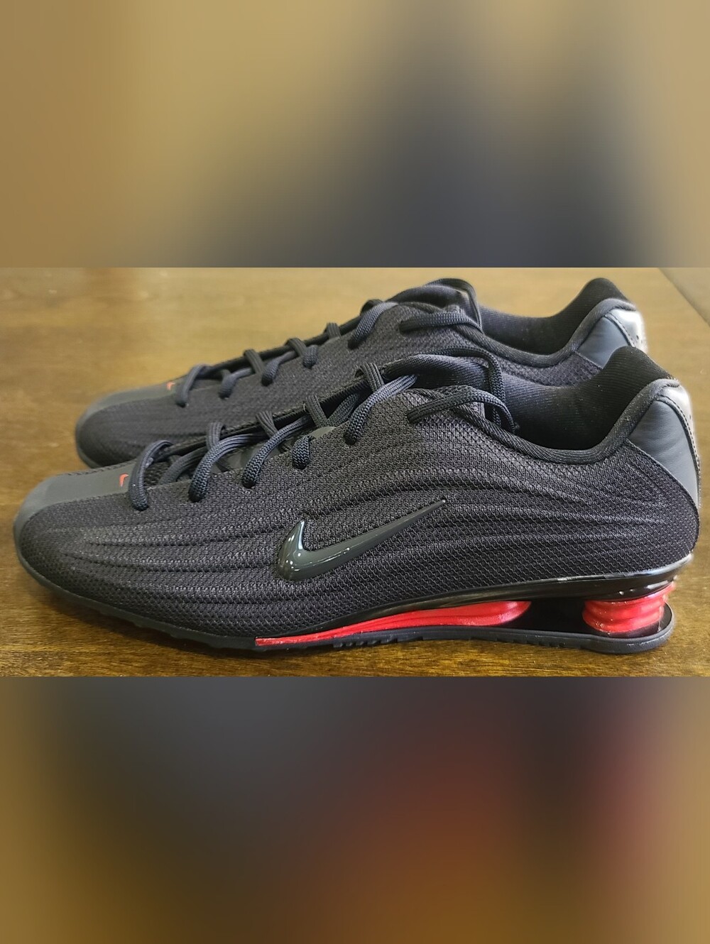 Nike Women's Black Running Sneakers with Red Air Accent
